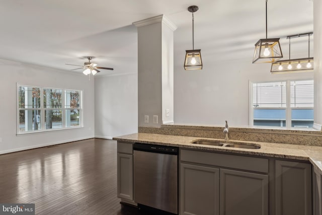 kitchen featuring sink, crown molding, hanging light fixtures, dishwasher, and light stone countertops