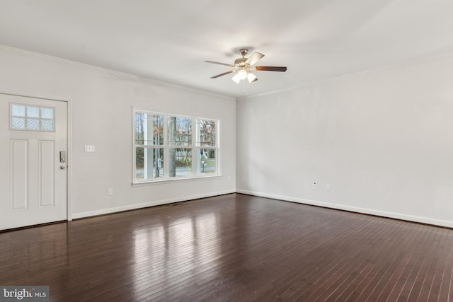 interior space with ornamental molding, dark hardwood / wood-style floors, and ceiling fan