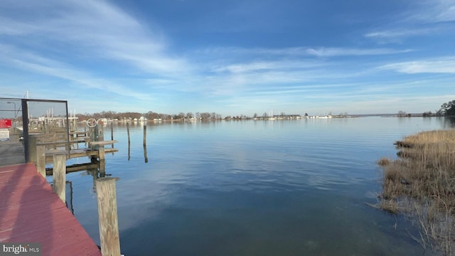 view of dock with a water view