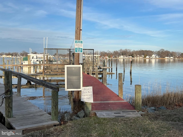 view of dock with a water view