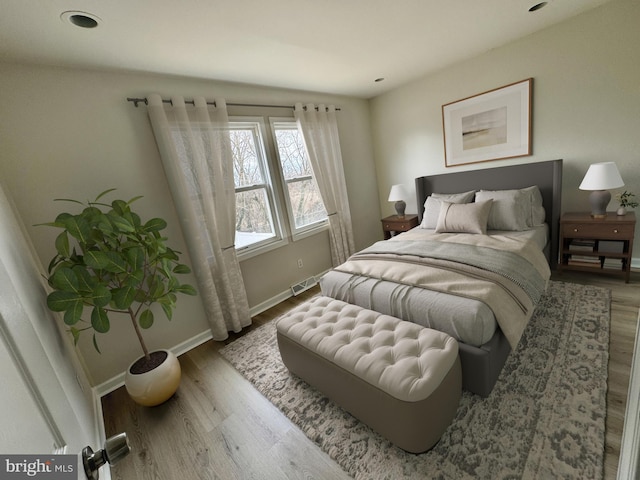 bedroom featuring hardwood / wood-style flooring