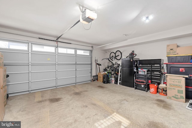 garage featuring a garage door opener