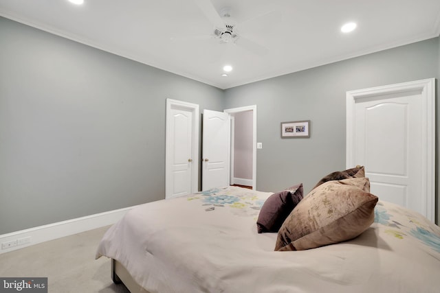 bedroom featuring recessed lighting, carpet floors, a ceiling fan, baseboards, and crown molding