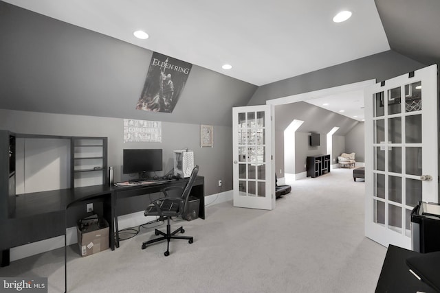 home office featuring lofted ceiling, carpet floors, french doors, and recessed lighting