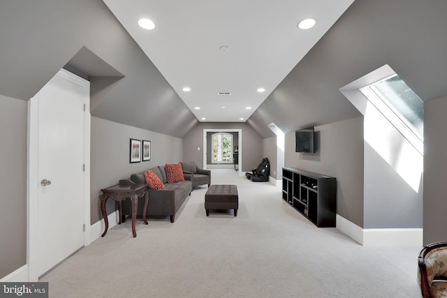 living area with vaulted ceiling, recessed lighting, baseboards, and light colored carpet