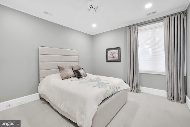 bedroom featuring light carpet, visible vents, baseboards, and recessed lighting