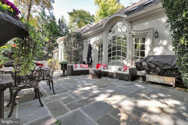 view of patio featuring an outdoor hangout area and grilling area