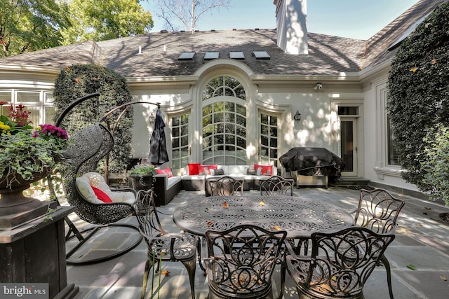 view of patio featuring an outdoor living space and grilling area