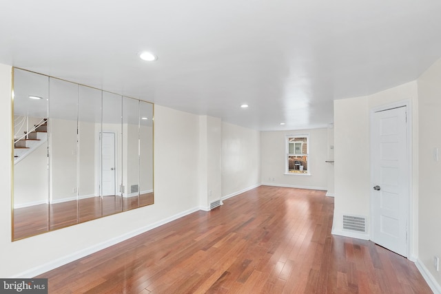 unfurnished room featuring light wood-type flooring