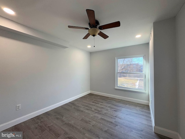 unfurnished room featuring wood-type flooring and ceiling fan