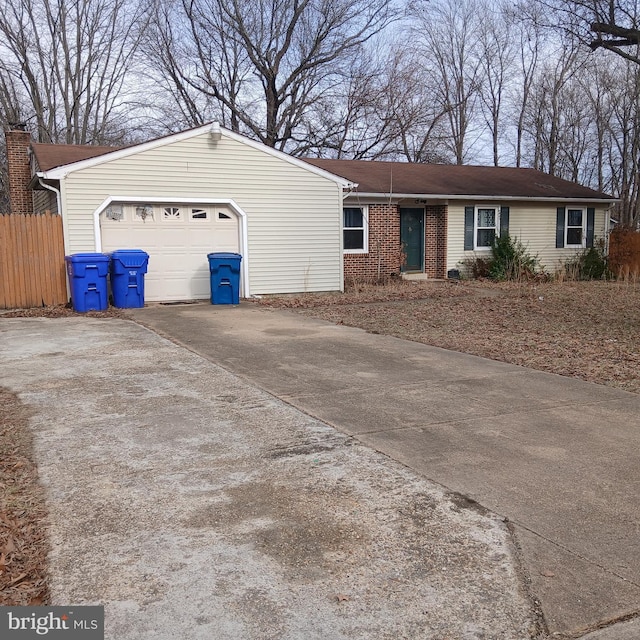 single story home featuring a garage