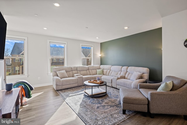 living room with light hardwood / wood-style flooring