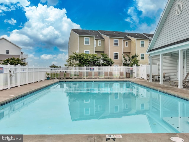 view of pool featuring a patio