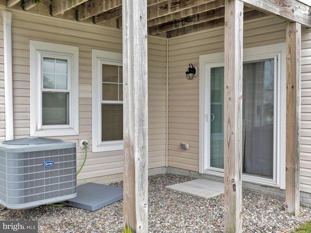 entrance to property with central AC unit