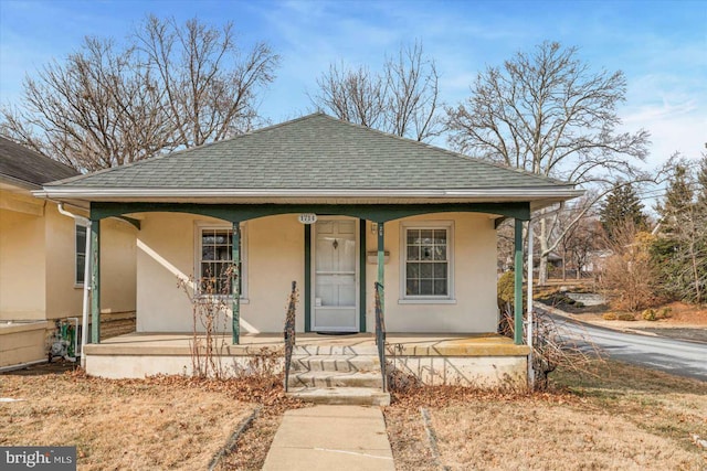 bungalow-style house featuring covered porch