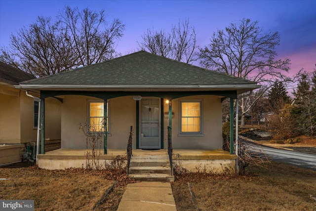 bungalow-style home with a porch