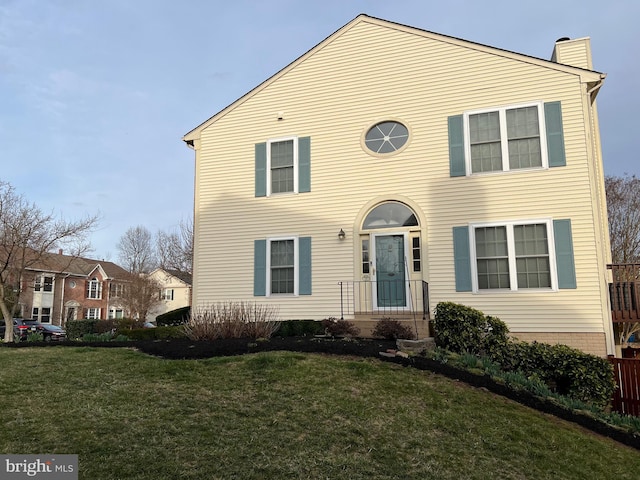 view of front of property with a front yard