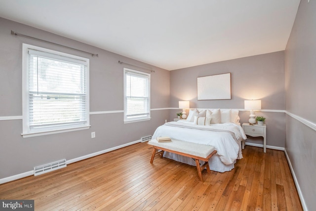 bedroom featuring light hardwood / wood-style floors