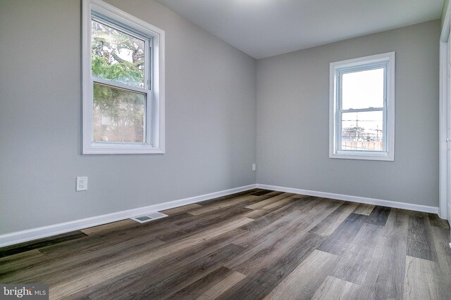 5006 Edgewood Rd, College Park, MD 20740 - spare room with dark hardwood / wood-style flooring