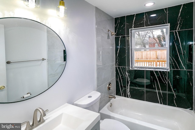 5006 Edgewood Rd, College Park, MD 20740 - full bathroom featuring tiled shower / bath combo, vanity, and toilet