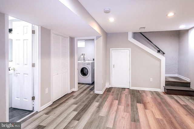 5006 Edgewood Rd, College Park, MD 20740 - clothes washing area featuring wood-type flooring and washer and dryer