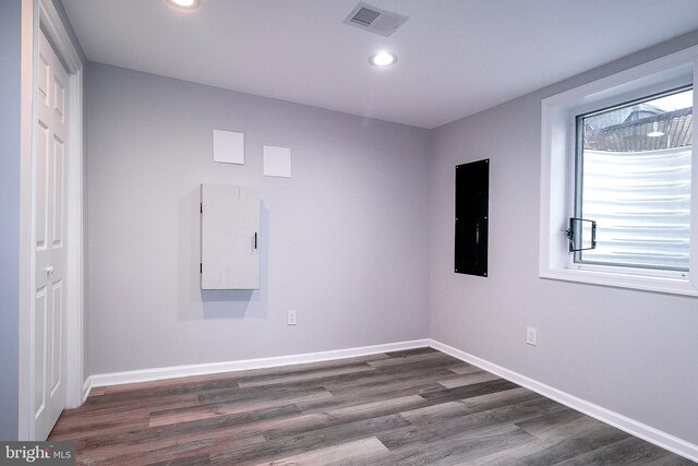 5006 Edgewood Rd, College Park, MD 20740 - spare room with dark hardwood / wood-style flooring and electric panel