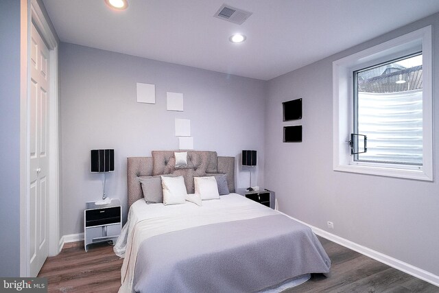 5006 Edgewood Rd, College Park, MD 20740 - bedroom featuring dark hardwood / wood-style flooring