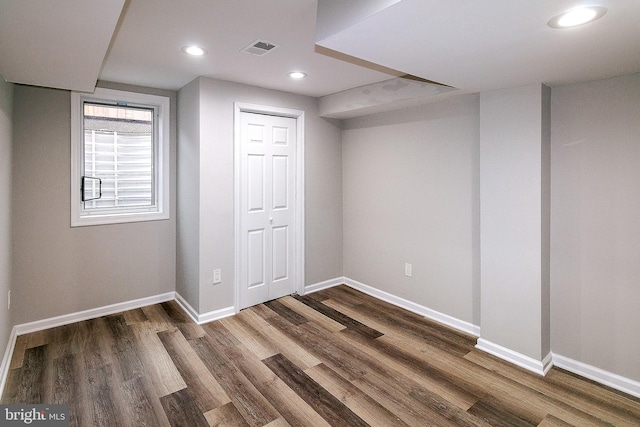 5006 Edgewood Rd, College Park, MD 20740 - basement with dark hardwood / wood-style flooring