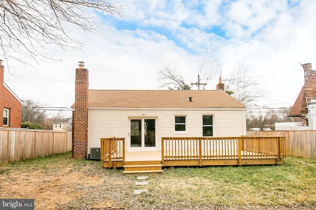 5006 Edgewood Rd, College Park, MD 20740 - back of property with a wooden deck, a yard, and central air condition unit