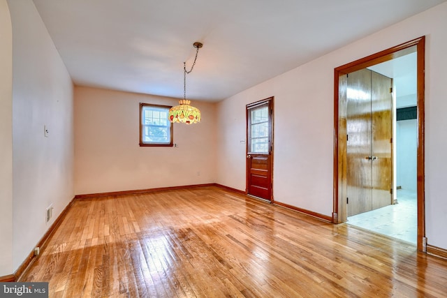 unfurnished dining area featuring light hardwood / wood-style floors