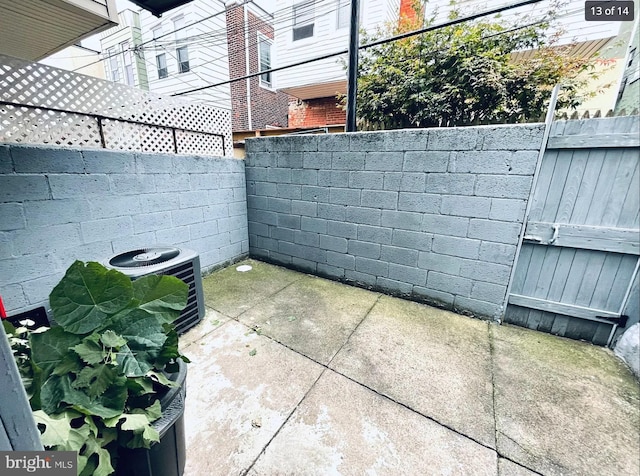 view of patio with central AC unit