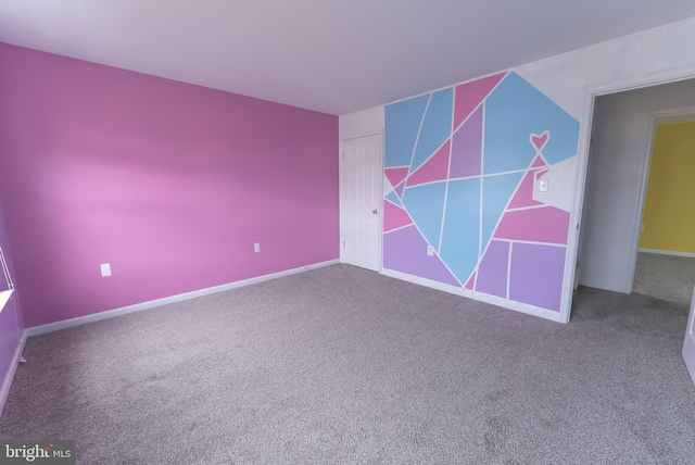 unfurnished bedroom with carpet flooring