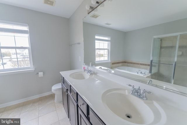 full bathroom with vanity, tile patterned flooring, independent shower and bath, and toilet