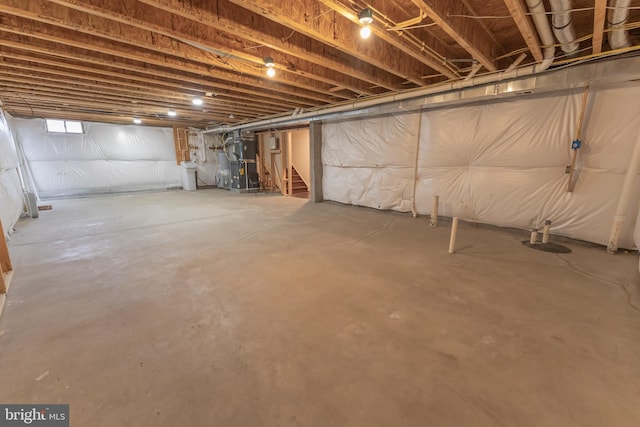 basement featuring heating unit