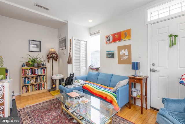 living room with hardwood / wood-style floors