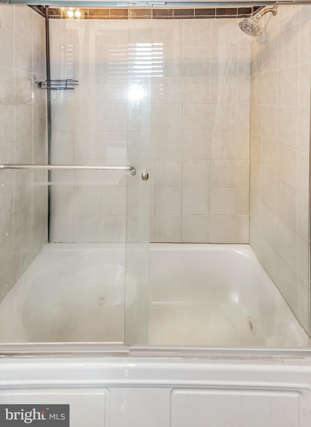 full bathroom with shower / washtub combination