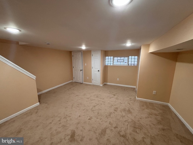 basement with light carpet