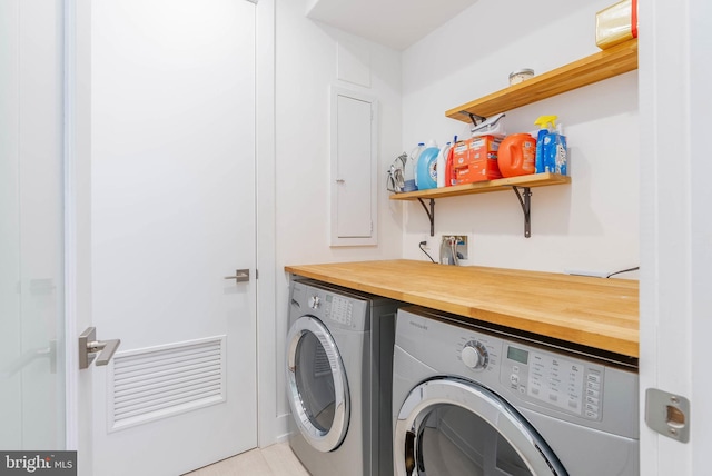 laundry area featuring separate washer and dryer