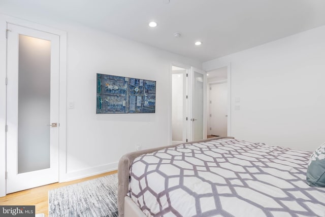 bedroom featuring hardwood / wood-style floors