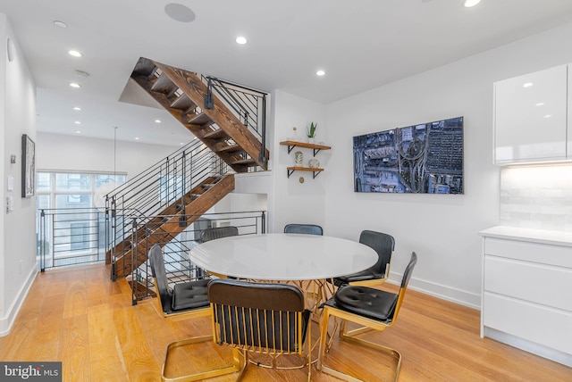 dining room featuring light hardwood / wood-style flooring