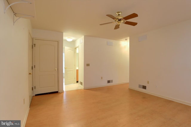 unfurnished room with light hardwood / wood-style flooring and ceiling fan