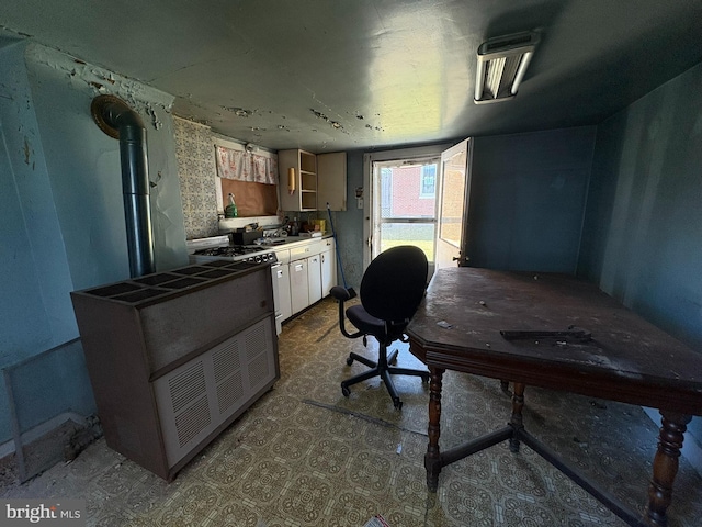 kitchen with white cabinets