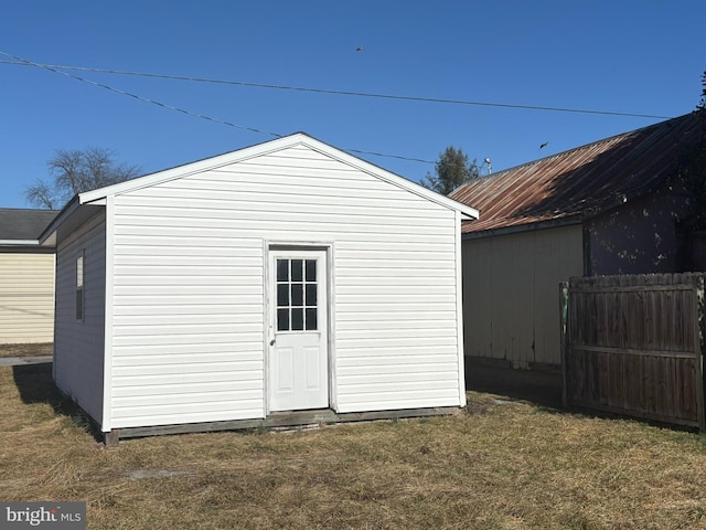 view of outdoor structure with a yard