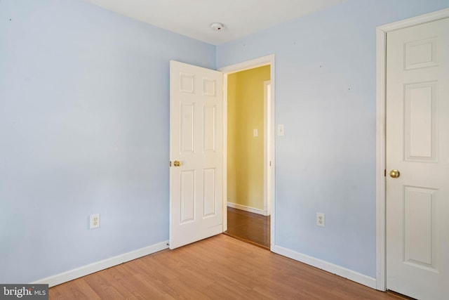 unfurnished bedroom featuring light hardwood / wood-style floors