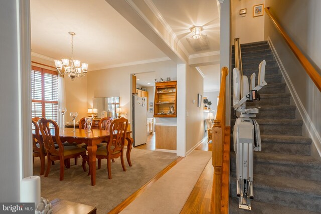 23137 Pine Run, Millsboro, DE 19966 - dining room featuring ornamental molding, hardwood / wood-style floors, and an inviting chandelier