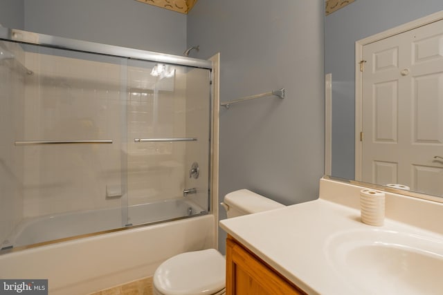 23137 Pine Run, Millsboro, DE 19966 - full bathroom with enclosed tub / shower combo, vanity, and toilet