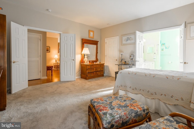23137 Pine Run, Millsboro, DE 19966 - bedroom featuring light carpet and connected bathroom