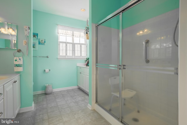 23137 Pine Run, Millsboro, DE 19966 - bathroom with vanity and a shower with shower door