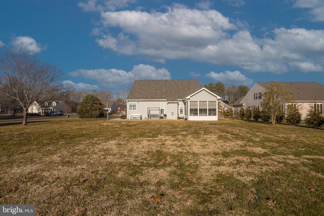 23137 Pine Run, Millsboro, DE 19966 - rear view of property featuring a sunroom and a yard