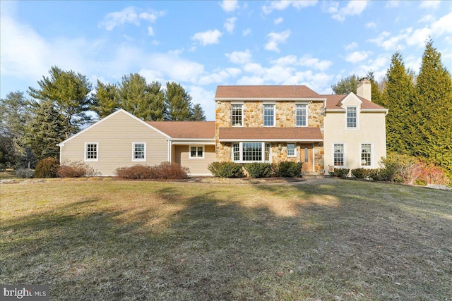 view of front of house featuring a front yard